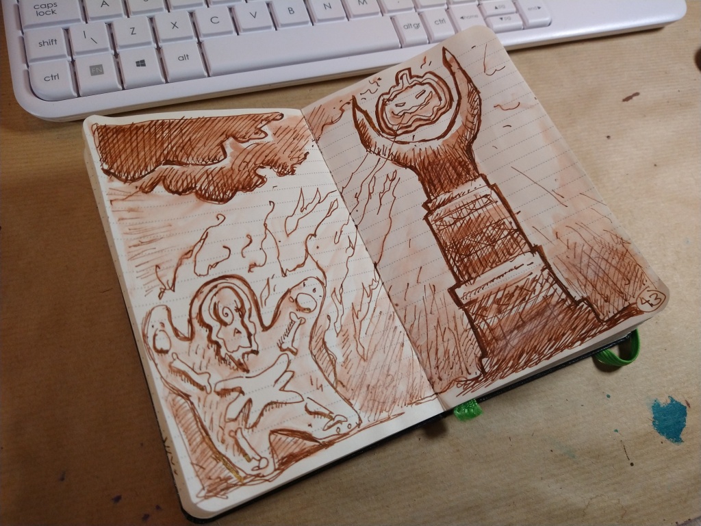 A photograph of a sketchbook with an ink picture of a gingerbread biscuit character being desroyted by a flame.